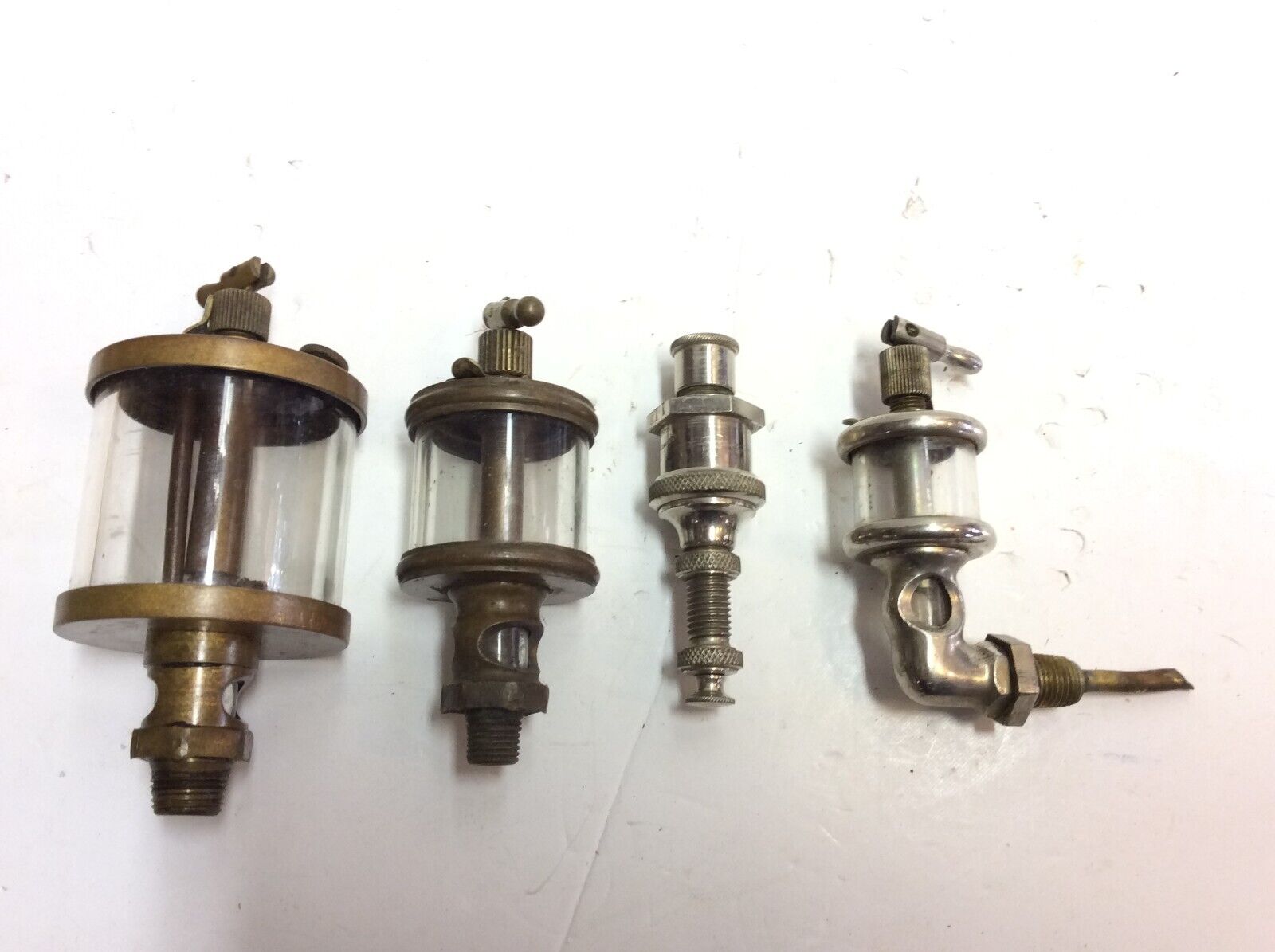Lot of 4 Vintage  Brass and Glass Hit Miss ENGINE OR OTHERS  Oilers