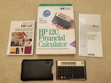 HP Hewlett Packard 12C Financial Calculator in box with case, manual, papers picture
